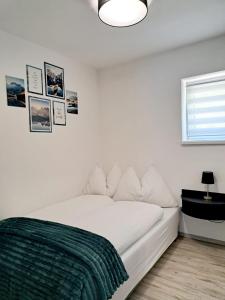Postel nebo postele na pokoji v ubytování Ferienwohnung Kapar + 21 fotografií