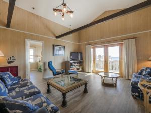 a living room with a couch and a table at Pelican Perch in Surf City