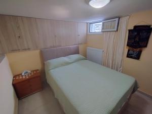 Кровать или кровати в номере Sofia's sea view house