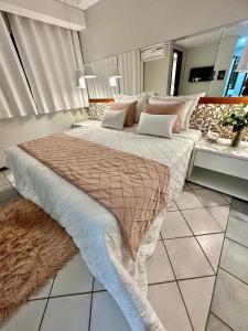 Postel nebo postele na pokoji v ubytování Porty Brasil Hotel