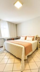 Postel nebo postele na pokoji v ubytování Porty Brasil Hotel