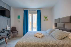 Katil atau katil-katil dalam bilik di Guest House Arsenal Accommodation