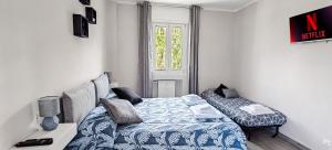 Postel nebo postele na pokoji v ubytování Rome Essence Apartament