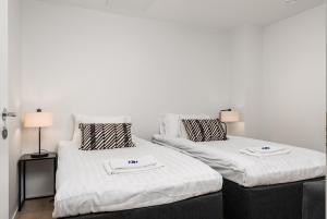 En eller flere senge i et værelse på Borg Loft City Central + 5 billeder