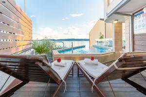 Bazén v ubytovaní Apartments Villa Tomaš alebo v jeho blízkosti
