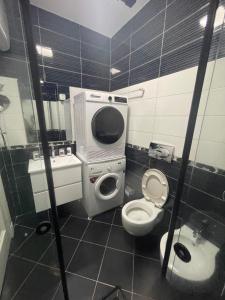 Bilik mandi di Deoni apartment Luxury +36 gambar