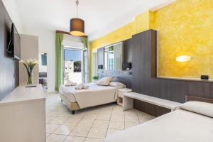 Postel nebo postele na pokoji v ubytování Hotel Vienna + 37 fotografií