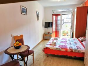 Postel nebo postele na pokoji v ubytování Durakovic Apartments