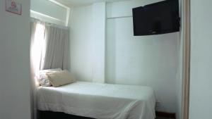 Postel nebo postele na pokoji v ubytování Hotel Plaza Formosa