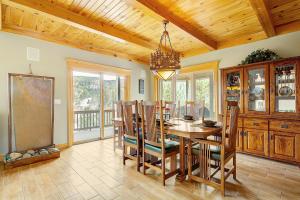 a dining room with a table and chairs at Secluded & Spacious Mountain Getaway in Morrison
