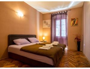 Postel nebo postele na pokoji v ubytování Perast apartman "Mika"
