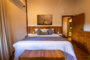 Cama ou camas em um quarto em Pousada Rancho Soberbo, Serra do Cipó