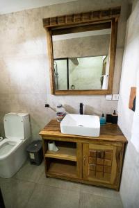 Koupelna v ubytování La Teranga Apartament Parrot
