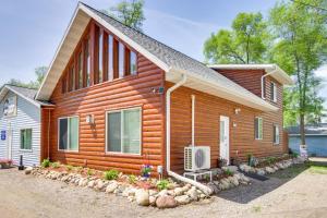 a log cabin with a porch at Eagles Nest Cabin on Mille Lacs Lake Boat and Fish in Garrison