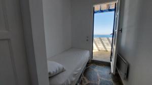 Postel nebo postele na pokoji v ubytování Callisto Tinos