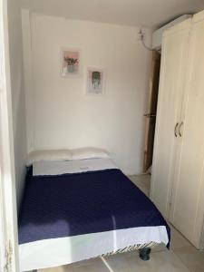 Postel nebo postele na pokoji v ubytování Veranera Hostal