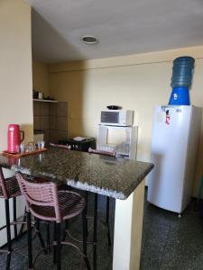 Kuchyň nebo kuchyňský kout v ubytování Apartamento na Praia de Iracema com vista mar