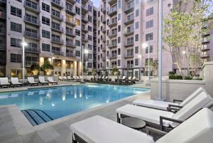 an image of a swimming pool in a building at Global Luxury Suites Midtown Atlanta in Atlanta