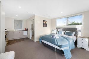 ASURE Oakleigh Motel客房内的一张或多张床位