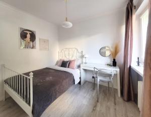 Posteľ alebo postele v izbe v ubytovaní Warsaw Concierge Opera Apartment
