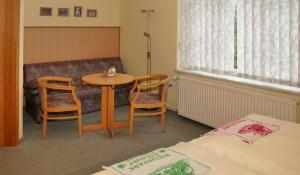 Postel nebo postele na pokoji v ubytování Pension Jeschkenblick