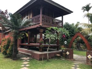 Zahrada ubytování Bello Ethnic Bungalow & Resto