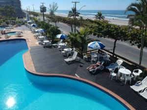 Bazén v ubytování Condomínio Resort Ilhas do Caribe nebo v jeho okolí
