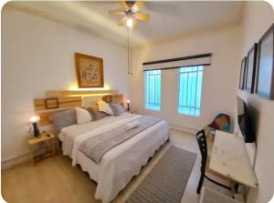 En eller flere senge i et værelse på CONDESA Host 3