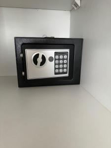 a black and white microwave on a wall at The Silhouette in Paarl