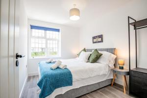 Ένα ή περισσότερα κρεβάτια σε δωμάτιο στο Host & Stay - Croydon Road Apartments