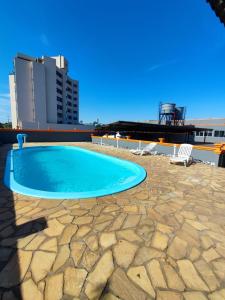 Bazén v ubytování PORTAL PARQUE HOTEL nebo v jeho okolí