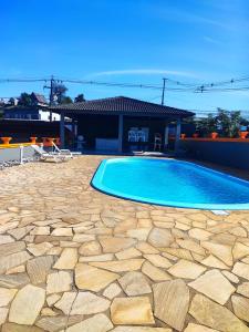 Bazén v ubytování PORTAL PARQUE HOTEL nebo v jeho okolí