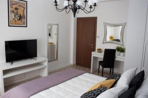 TV a/nebo společenská místnost v ubytování Rio Venice