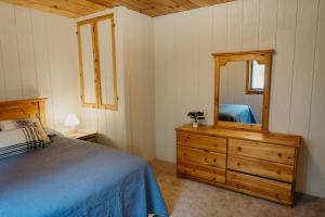 Postel nebo postele na pokoji v ubytování Alaska Cozy Cabins