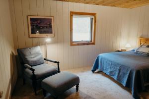 Postel nebo postele na pokoji v ubytování Alaska Cozy Cabins