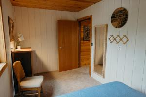Postel nebo postele na pokoji v ubytování Alaska Cozy Cabins