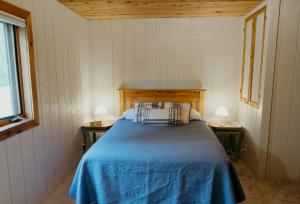 Postel nebo postele na pokoji v ubytování Alaska Cozy Cabins