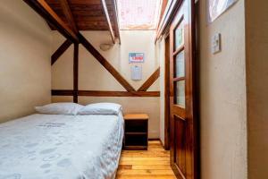 Кровать или кровати в номере Hostal La Suite
