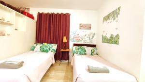 Katil atau katil-katil dalam bilik di Olango Transient Home,with WIFI &Netfix