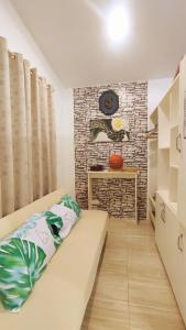 Katil atau katil-katil dalam bilik di Olango Transient Home,with WIFI &Netfix