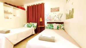 Katil atau katil-katil dalam bilik di Olango Transient Home,with WIFI &Netfix