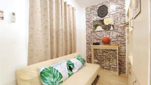 Ruang duduk di Olango Transient Home,with WIFI &Netfix