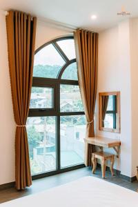 Voodi või voodid majutusasutuse Epic Đồng Văn Hotel toas