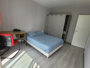 Postel nebo postele na pokoji v ubytování Appartement T4