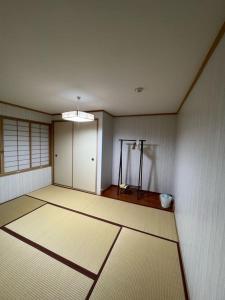 an empty room with a room with a room at 明和荘Mei Wa Inn in Kyoto