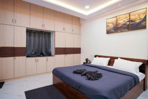 Posteľ alebo postele v izbe v ubytovaní N Cube Serviced Apartments