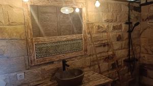 Salle de bains dans l'établissement D'Ume Bendoel Homestay
