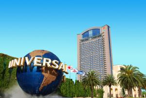 a large blue sphere in front of a building at Hotel Keihan Universal Tower in Osaka