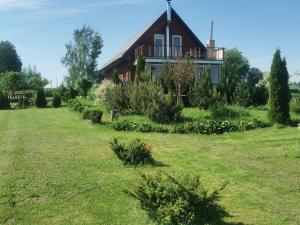 a house with a garden in front of it at Edmart in Dobromislė