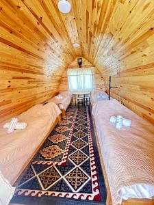 Postel nebo postele na pokoji v ubytování Eco Resort Kaiyrma